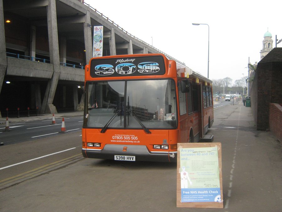 File:SOS Bus Medway Dennis Dart (S398 HVY) in orange livery on The Brook near multi-story car park, Chatham, Kent, England.jpg