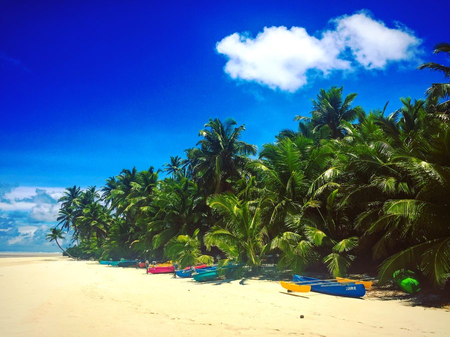Sandy beach and clear water in the Cocos (Keeling) Islands.