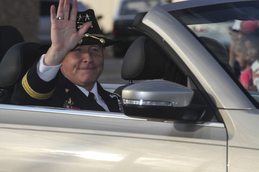 First Cavalry Division commanding general waving to the crowd during a parade in downtown Killeen, Texas