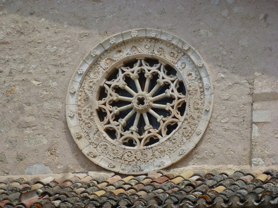 File:Rose window San Salvator Campi, Norcia PG, Italy.jpg