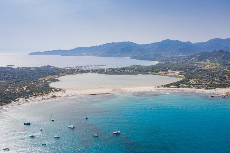File:Aerial view of the lake Stagno di Notteri with Marina di Villasimius in the background, Sardinia, Italy (48402743736).jpg